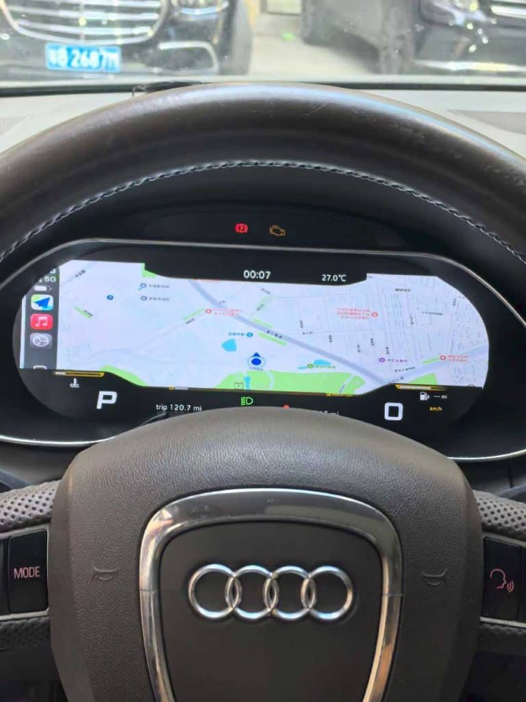Audi Q5 digital instrument cluster installed with map display behind the steering wheel