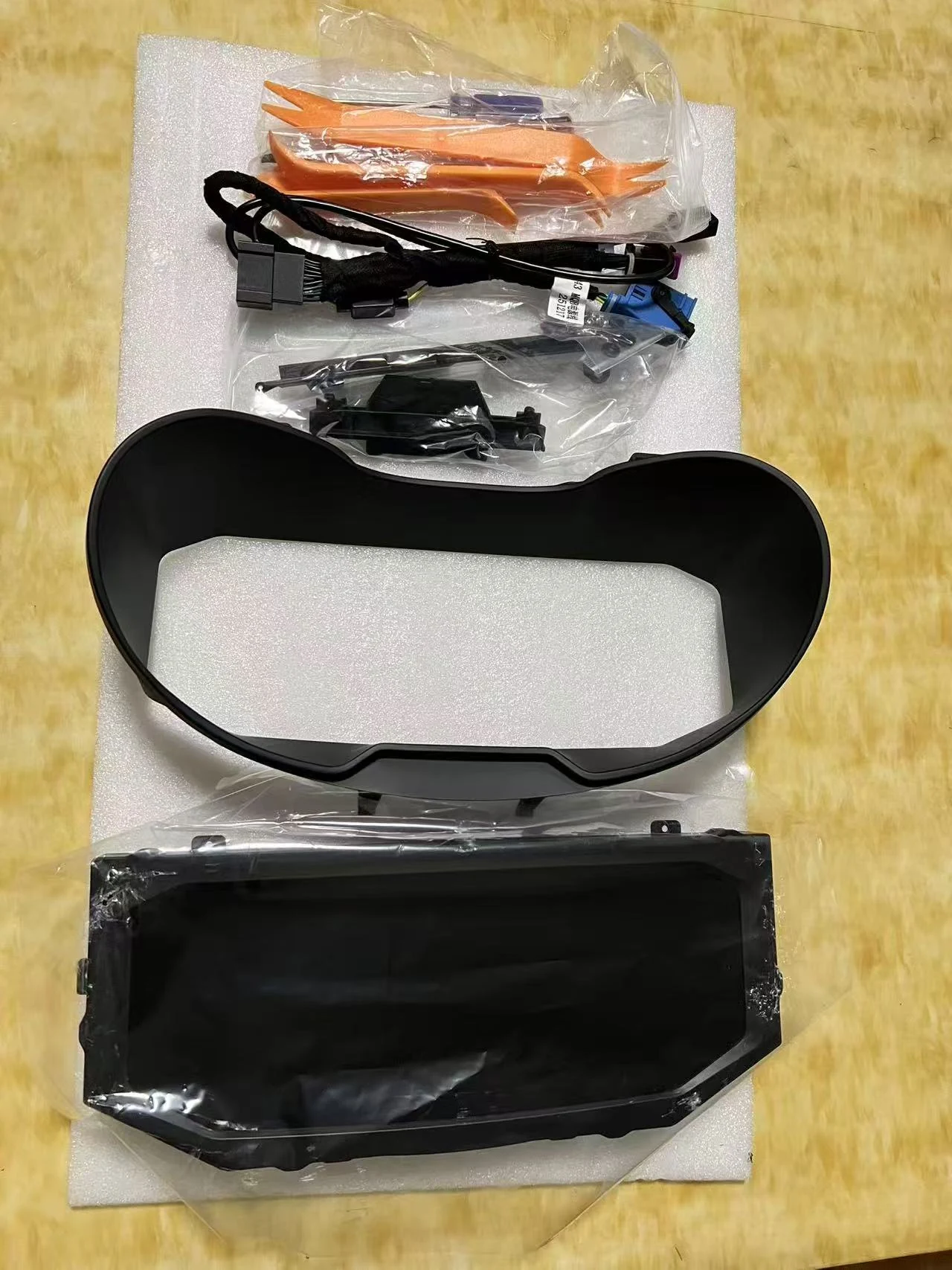 Wiring harnesses and installation accessories grouped separately in the shipment set