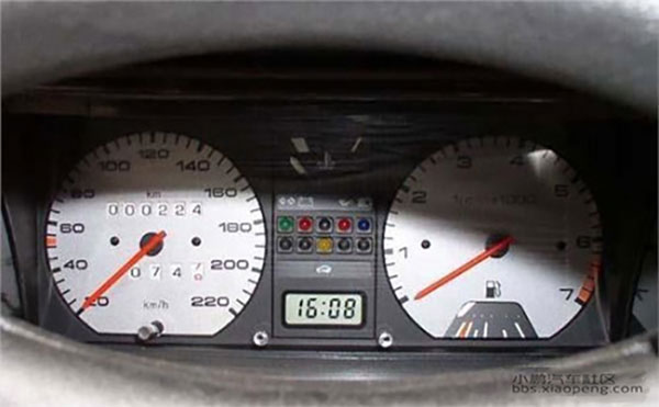 Early analog instrument cluster with mechanical needles