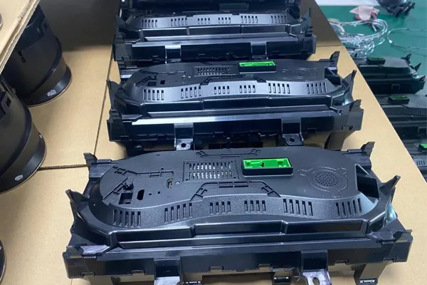 Digital cluster units prepared for protective packaging before shipment