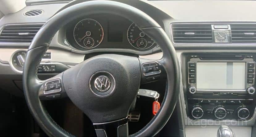Original vehicle center console layout before 2011-2015 Passat digital instrument cluster installation