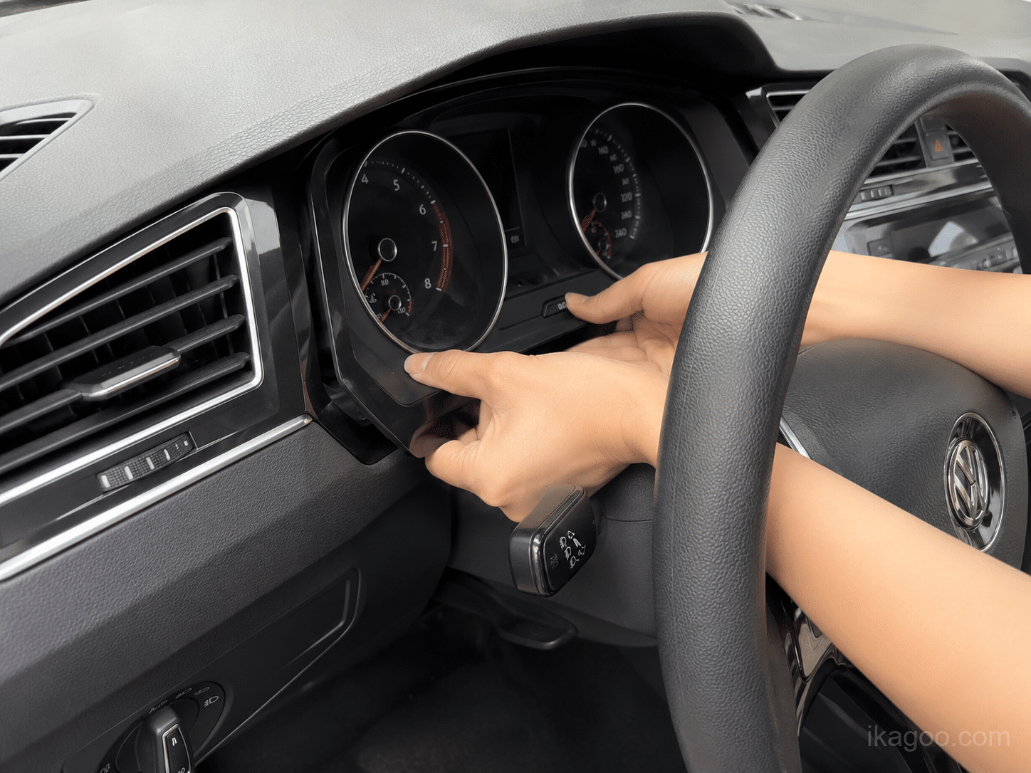 Pulling instrument trim clips by hand during Volkswagen Tiguan 2017-2022 Full LCD Instrument Cluster installation