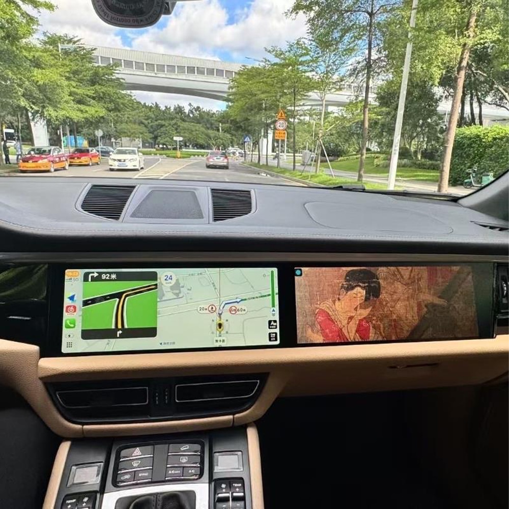 Porsche Macan Android dual screen showing navigation and media