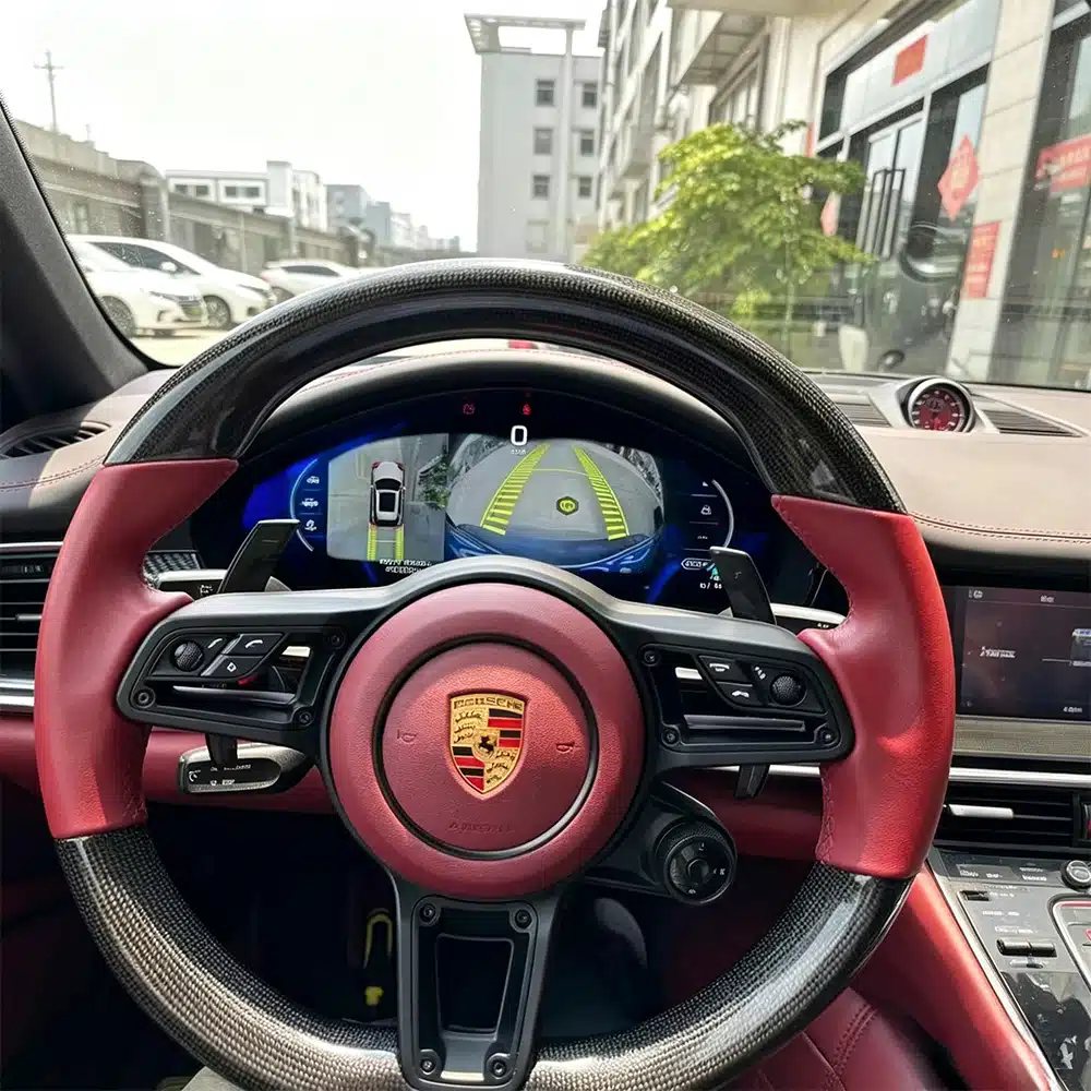 Porsche Cayenne digital cluster displaying a camera-related page