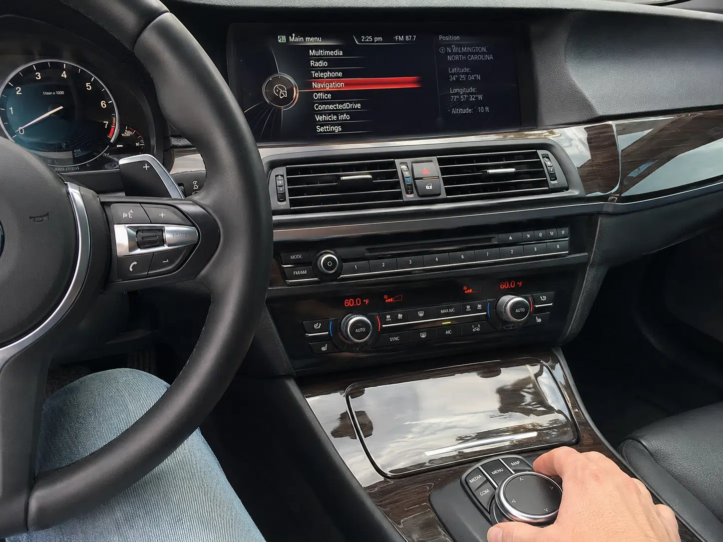 Factory Function Retention Standard for Head Unit & Digital Cluster Upgrades 3 BMW steering-wheel controls and iDrive controller operating an upgraded display
