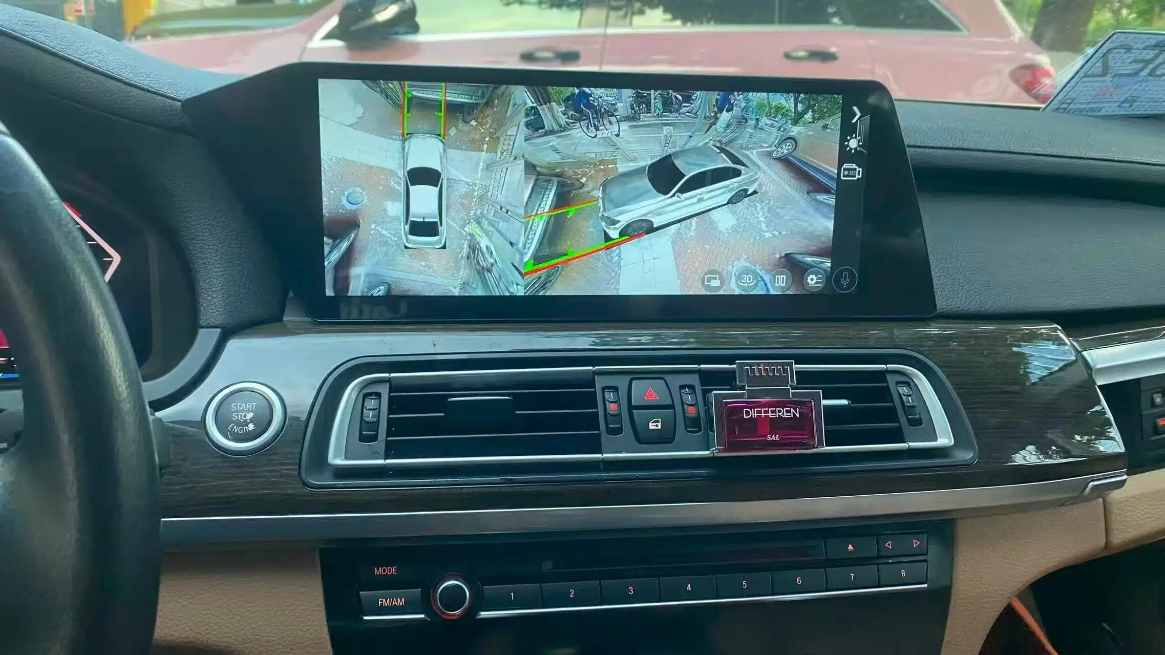 BMW X5 Android head unit showing reverse camera parking trajectory and 360-degree view