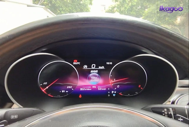 Completed Mercedes W205 digital cluster displaying vehicle data after installation