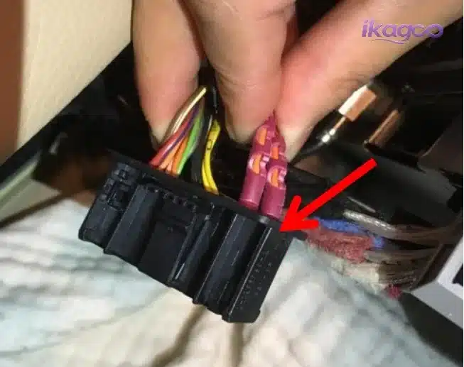 Mercedes W221 original head unit removal before Android navigation wiring and AUX LVDS connection