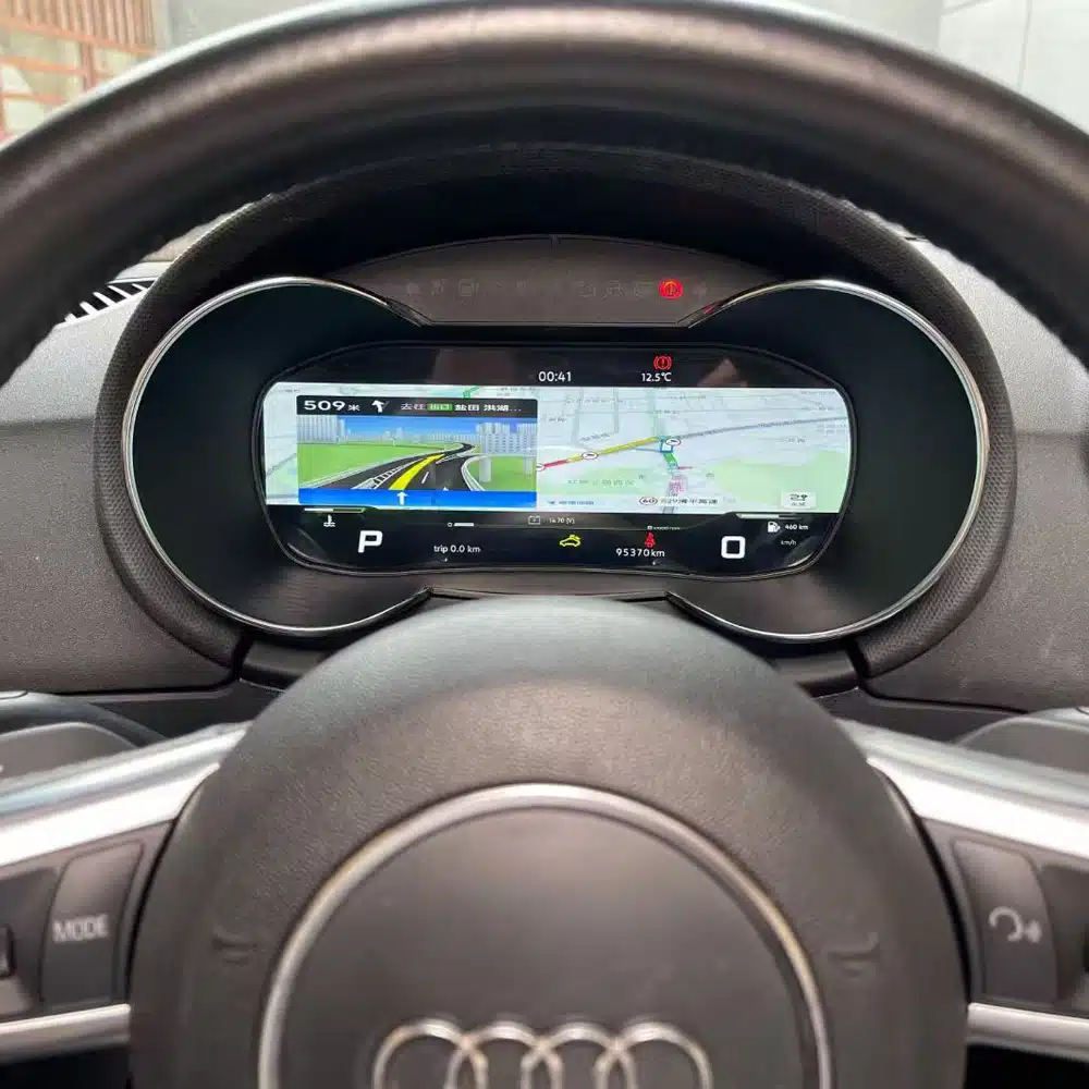 Audi TT Mk2 8J virtual cockpit showing real-time navigation map and route guidance