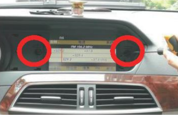 Mercedes W204 Android Head Unit Installation step 7 removing the original monitor fixing screws